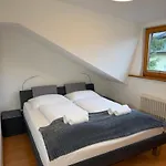Undertheroof At *